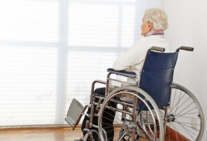 Elderly man in a wheel chair at a nursing home in Tulsa